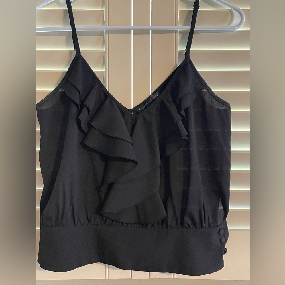Crop spaghetti strap top with ruffles Bottom band closes with covered buttons. M